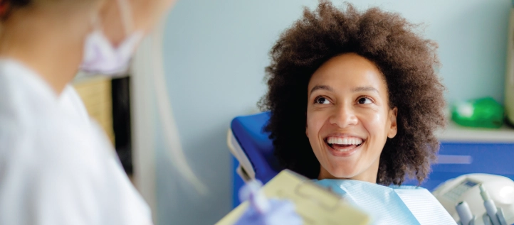 Young woman smiling after her dental filling