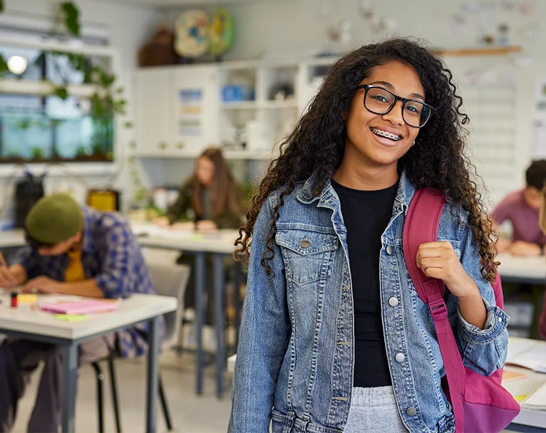Young female student smiling with braces