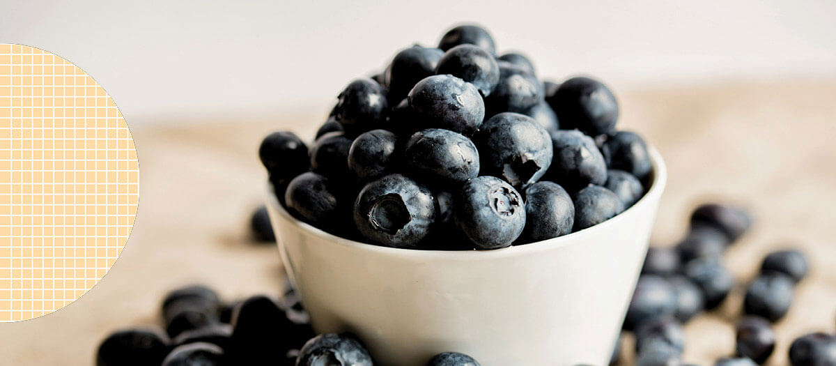 Big overflowing bowl of blueberries