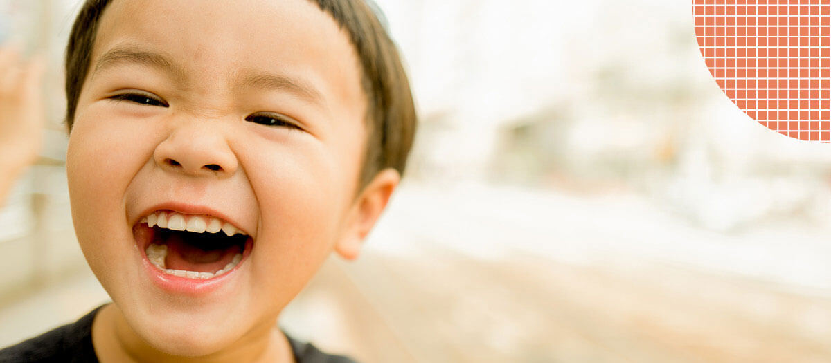 Kid smiling and laughing