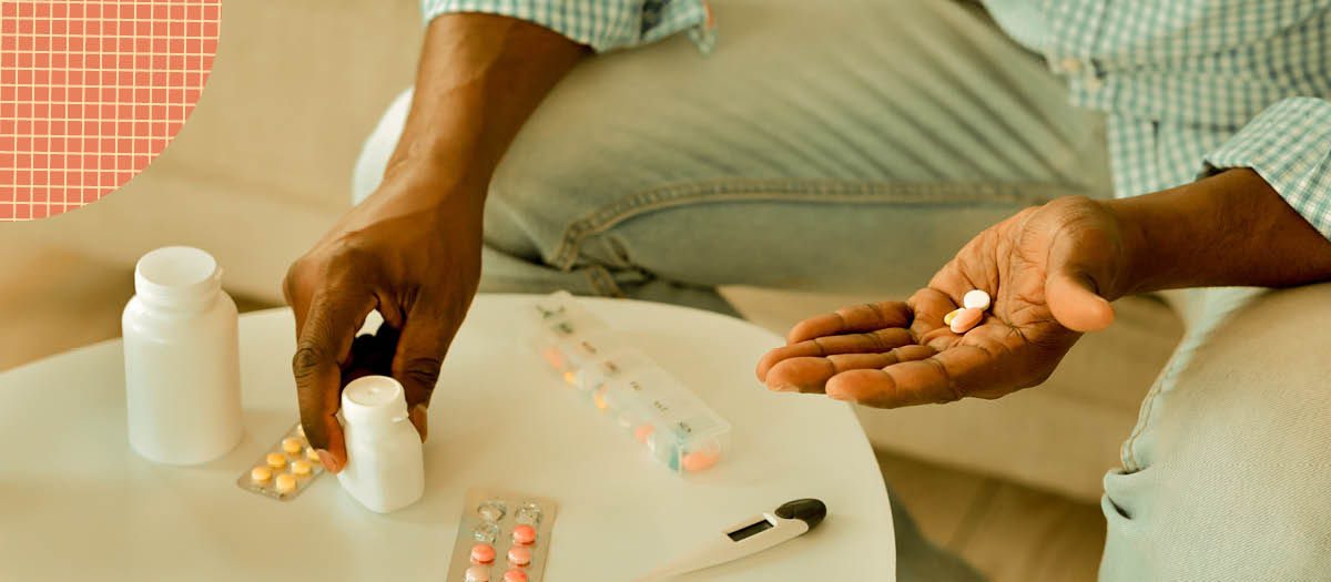 Adult male choosing daily medicine 