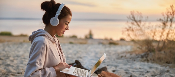 Young woman researching cavities on the beach